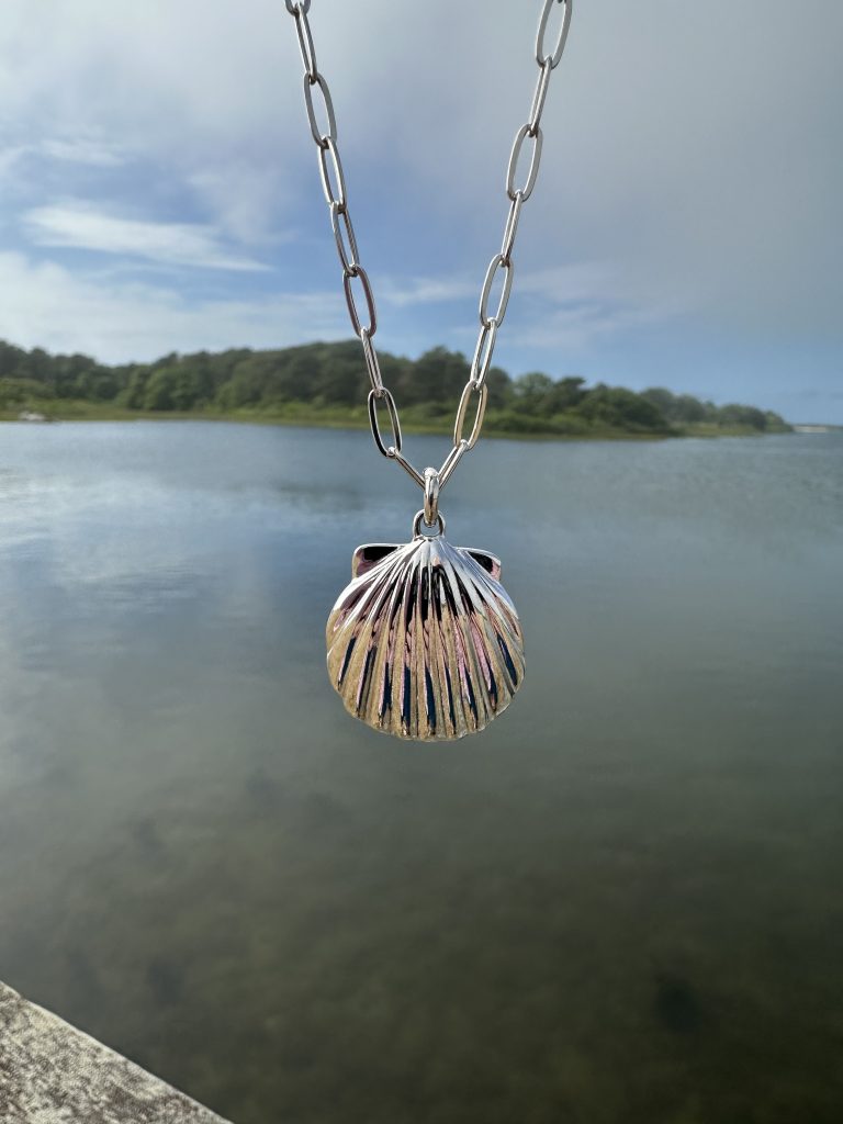 Lori Hart: Sterling silver large sculpted scallop shell pendant on silver link chain.
